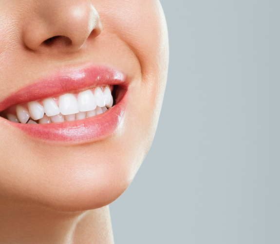 Close up of a smile with flawless straight white teeth