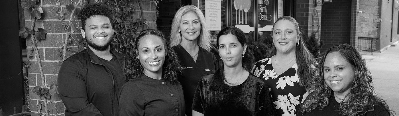 Siz smiling dental team members at Grand Dental - Oz Park in Lincoln Park