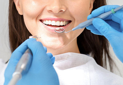 Woman receiving a dental exam
