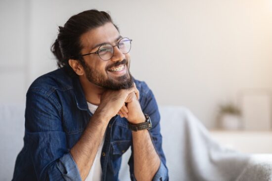 Man smiling with braces.